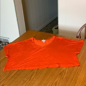 ADC crop tee, size juniors Medium.